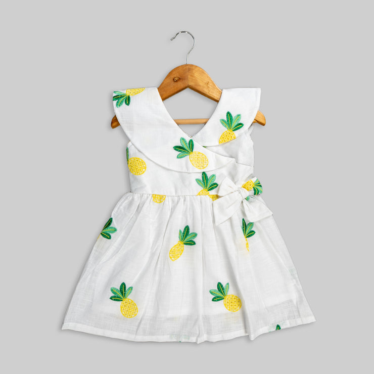 White Cotton Frock With Pineapple Embroidered Motif For Girls