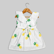 White Cotton Frock With Pineapple Embroidered Motif For Girls